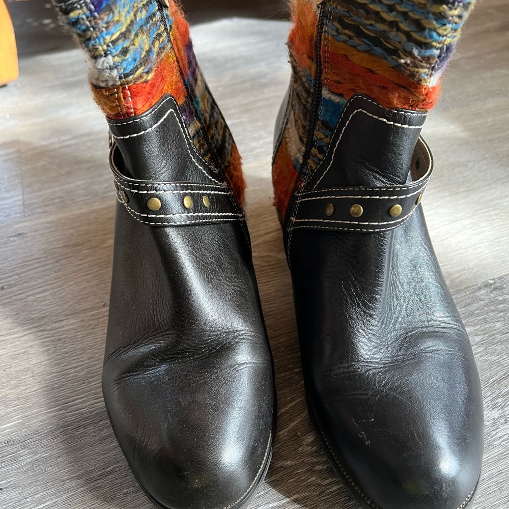 Stylish Black Ankle Boots with Brass Accents